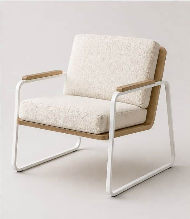 A modern armchair featuring a tubular metal frame in white, supporting a seat and back cushion uphol… — free OBJ 3D model