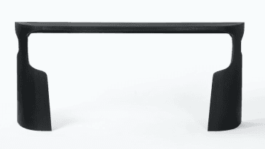 A modern, minimalist console table featuring a monolithic design with a matte black finish. It has a… — 3D model