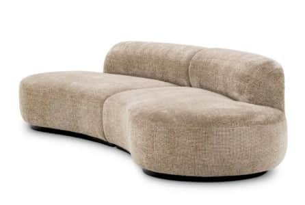 A contemporary, upholstered sofa with a sinuous, organic shape. It features a low profile, rounded a… — 3D model