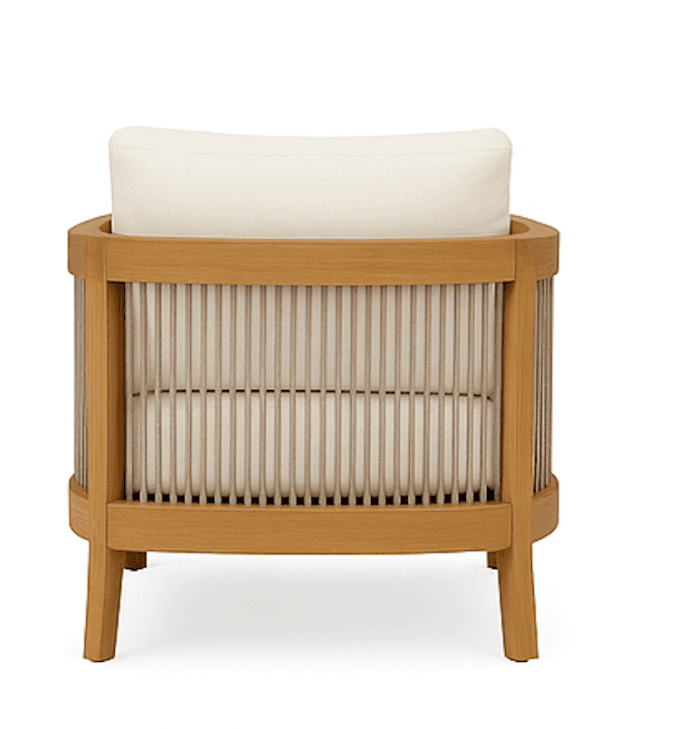 A contemporary armchair with a curved, cylindrical frame constructed from light-colored wood. The fr… — 3D model