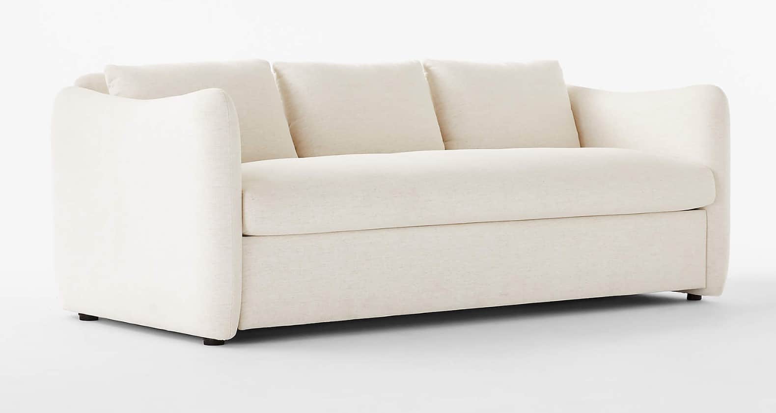A modern, low-profile sofa with a creamy off-white textured upholstery. It features generously padde… — free OBJ 3D model