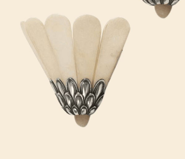 An Art Deco-style wall sconce featuring a fan-shaped shade composed of multiple translucent, off-whi… — 3D model