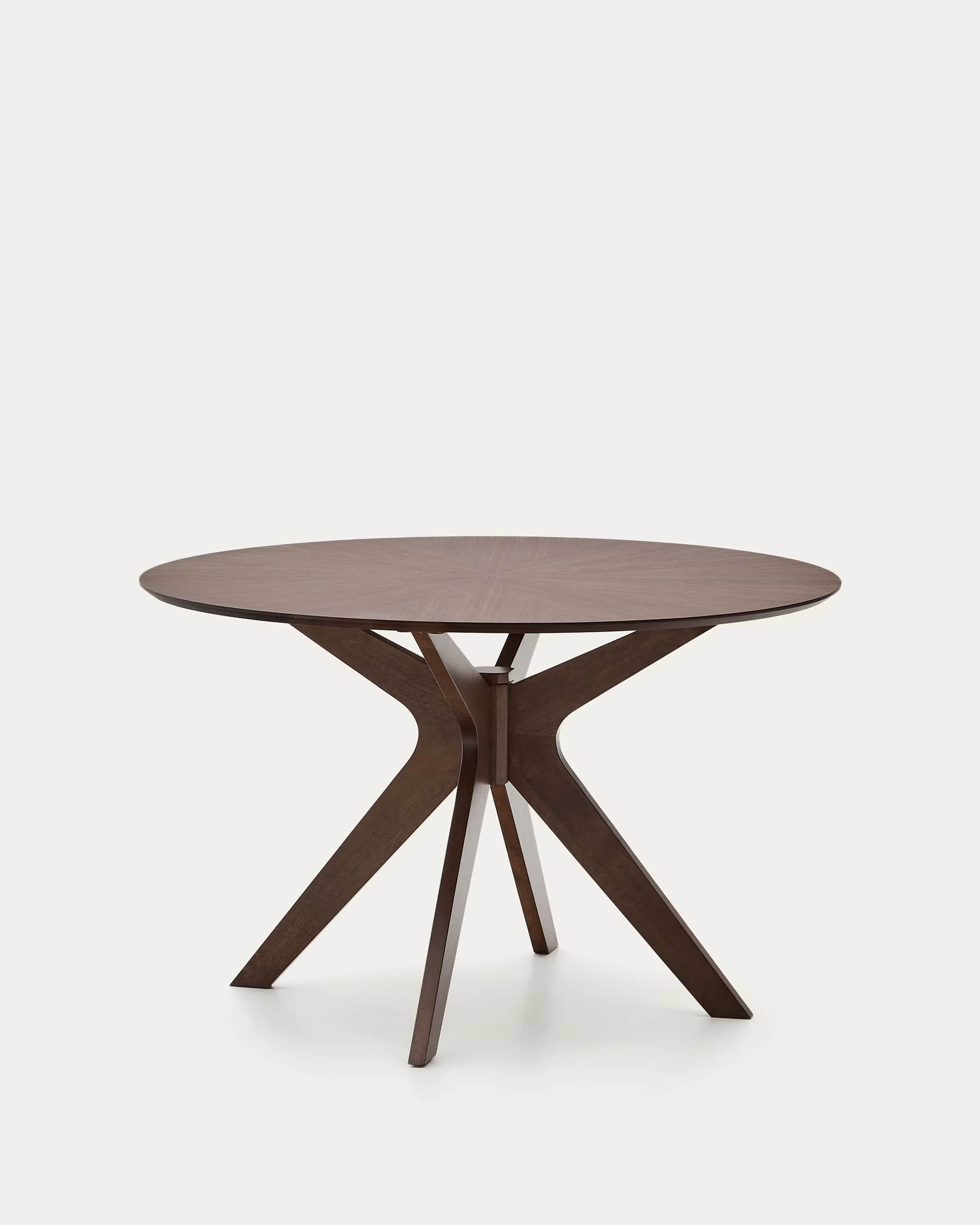 A round dark wood table featuring a striking pedestal base. The base consists of multiple angular an… — 3D model