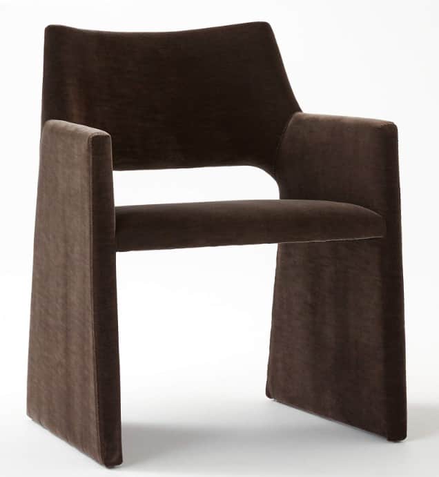 A contemporary dark brown velvet armchair featuring a fully upholstered monolithic design with integ… — 3D model