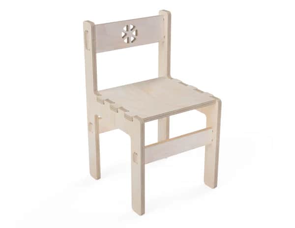 A child's chair constructed from light-colored plywood, featuring a slatted backrest with a decorati… — free FBX 3D model