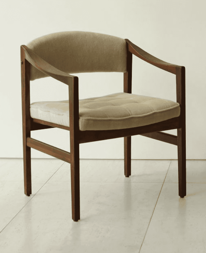 A mid-century modern armchair featuring a dark wood frame and light beige fabric upholstery. The cha… — 3D model