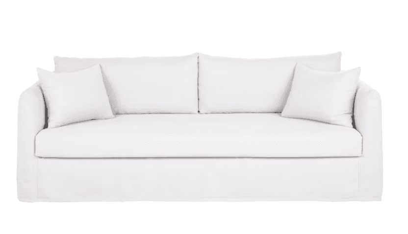 A white, slipcovered sofa featuring a skirted base, rolled arms, two large seat cushions, two back c… — 3D model