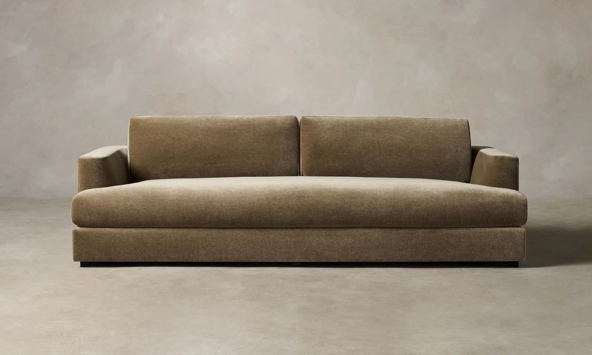 A contemporary sofa with a plush, textured upholstery. It features a low-profile rectangular base, s… — free FBX 3D model
