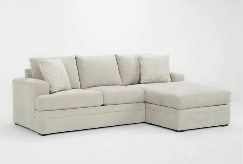 A contemporary L-shaped sectional sofa featuring a right-hand facing chaise. It is upholstered in a… — 3D model