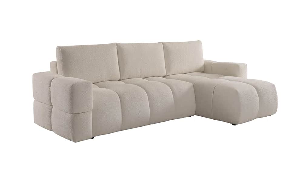 A large, L-shaped sectional sofa upholstered in a light, textured fabric, featuring a contemporary,… — 3D model