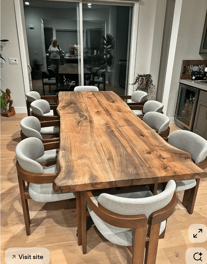A live-edge coffee table with a thick, solid wood slab top and two rectangular pedestal legs. The wo… — free FBX 3D model
