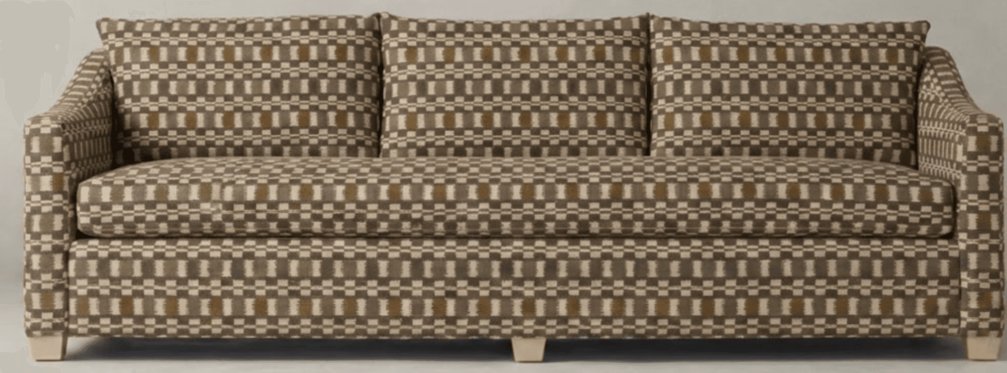 A three-seater sofa upholstered in a patterned fabric. The sofa has a straight back with three loose… — 3D model