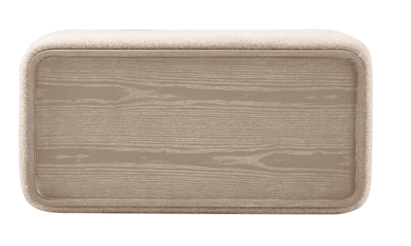 A rectangular upholstered ottoman featuring gently rounded corners and a soft, textured fabric top a… — 3D model