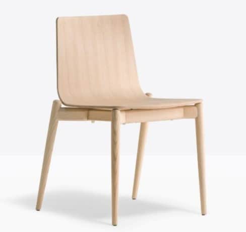 A modern chair constructed primarily from bent plywood and wood. The chair features a curved backres… — free GLTF 3D model