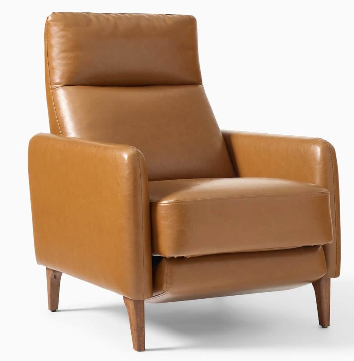 A modern armchair upholstered in a smooth, caramel-colored leather. It features a high backrest with… — 3D model