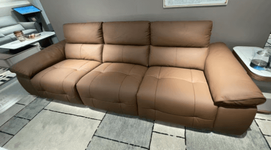 A modern three-seater sofa upholstered in brown leather, featuring individual seat and back cushions… — free SKP 3D model