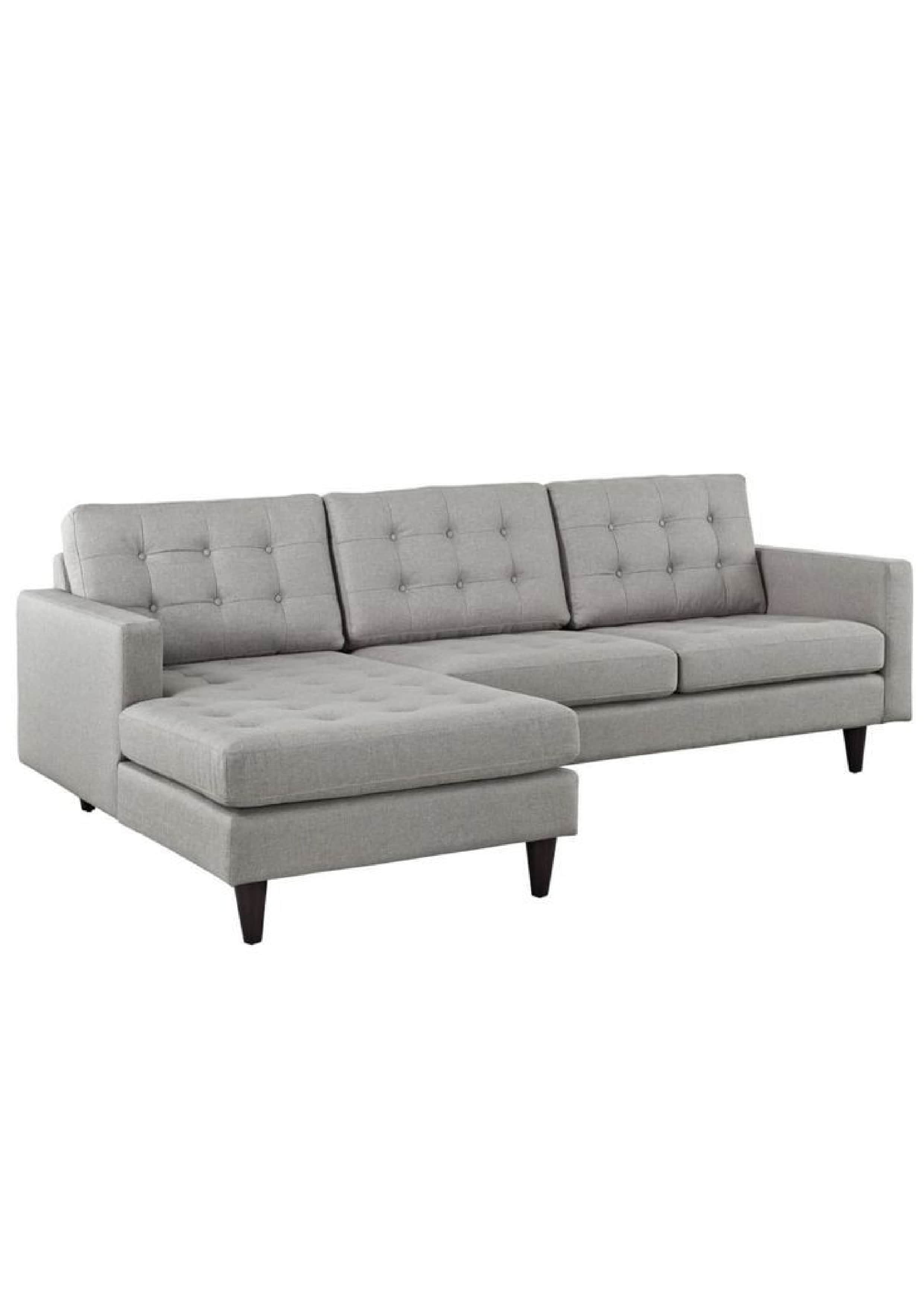 A light gray upholstered sectional sofa featuring a left-hand facing chaise lounge, button-tufted ba… — 3D model