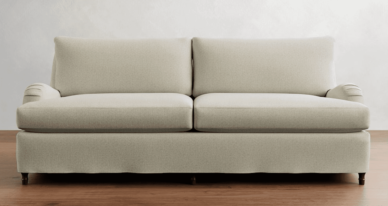 A contemporary sofa upholstered in a light-colored, textured fabric, featuring classic rolled armres… — 3D model