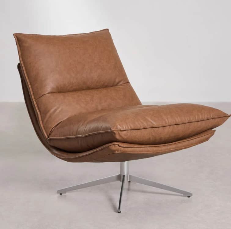 A modern armchair with a low-profile design and a swivel base. The chair features a deep seat and a… — free OBJ 3D model