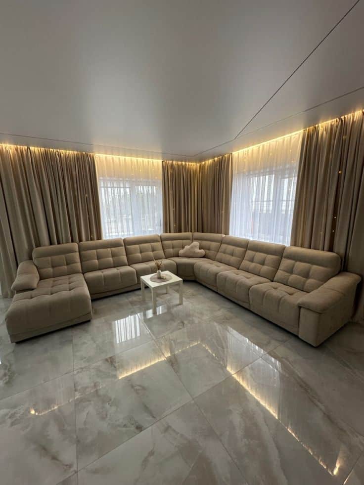 A contemporary modular U-shaped sectional sofa upholstered in a neutral beige woven fabric, featurin… — 3D model