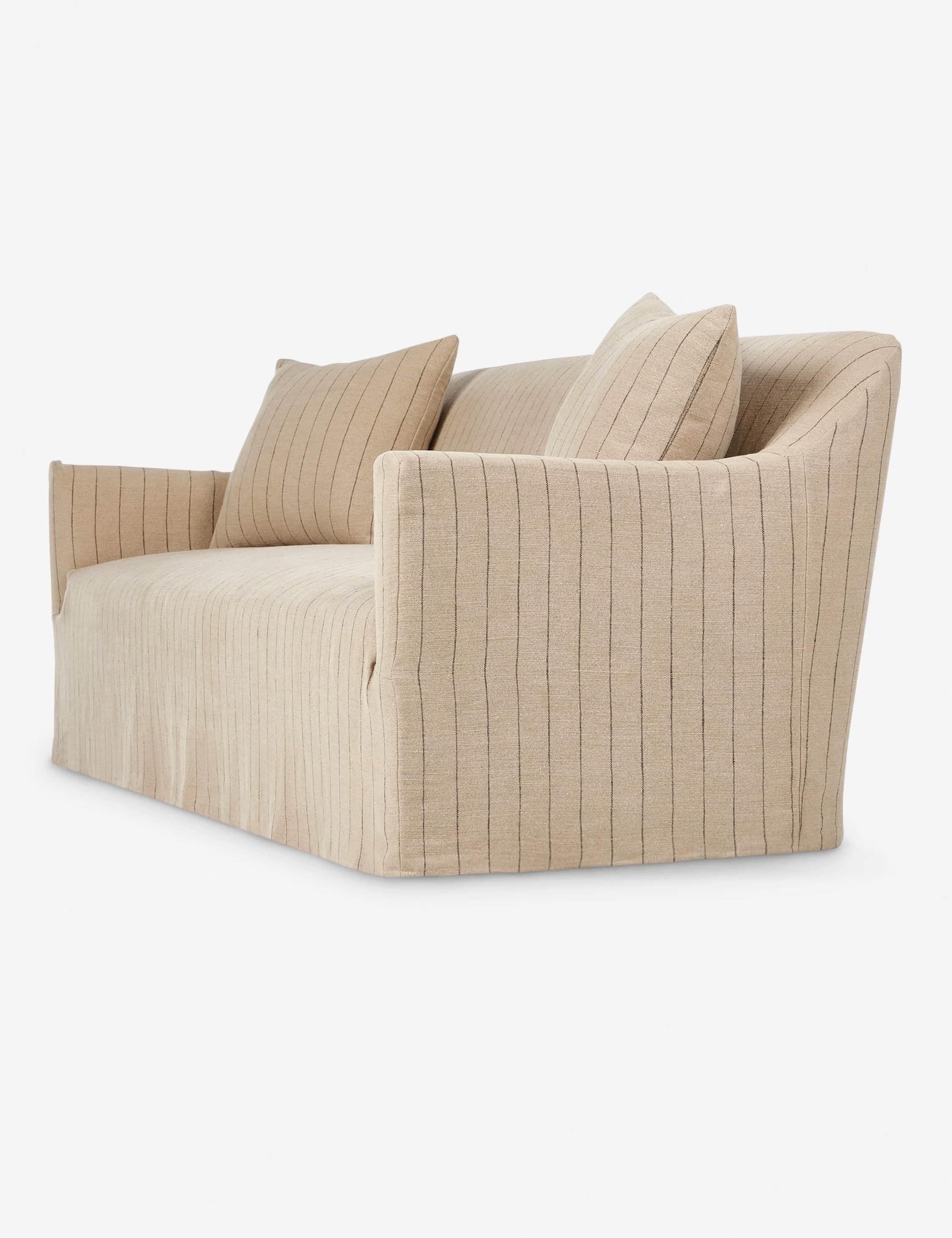 A modern upholstered loveseat featuring a skirted base and two back cushions, covered in a light bei… — free GLTF 3D model