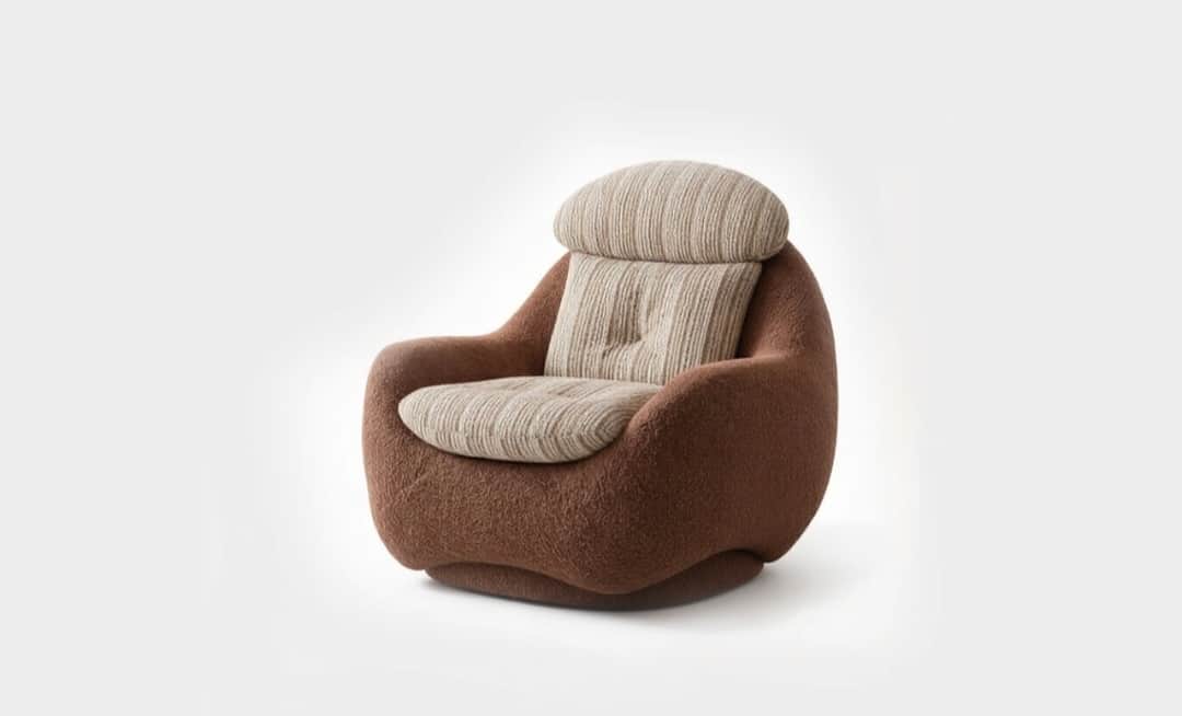A contemporary lounge chair with an organic, rounded, and plush form. The main body is upholstered i… — 3D model