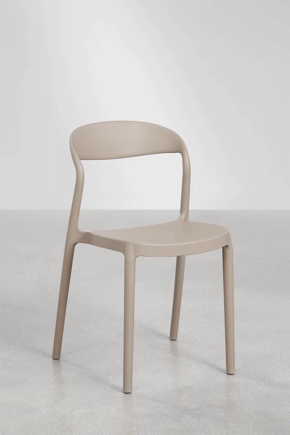 A modern, armless side chair constructed from a single piece of molded plastic in a neutral beige co… — free FBX 3D model