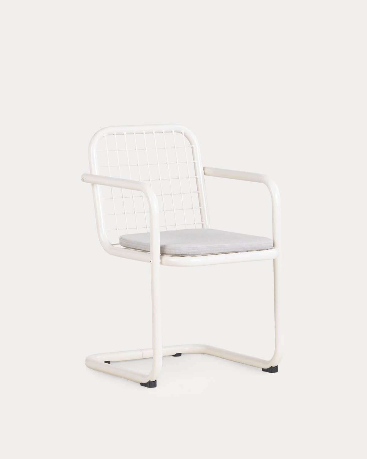 A modern armchair featuring a cream-colored tubular metal frame with a cantilever base, a grid-patte… — free OBJ 3D model