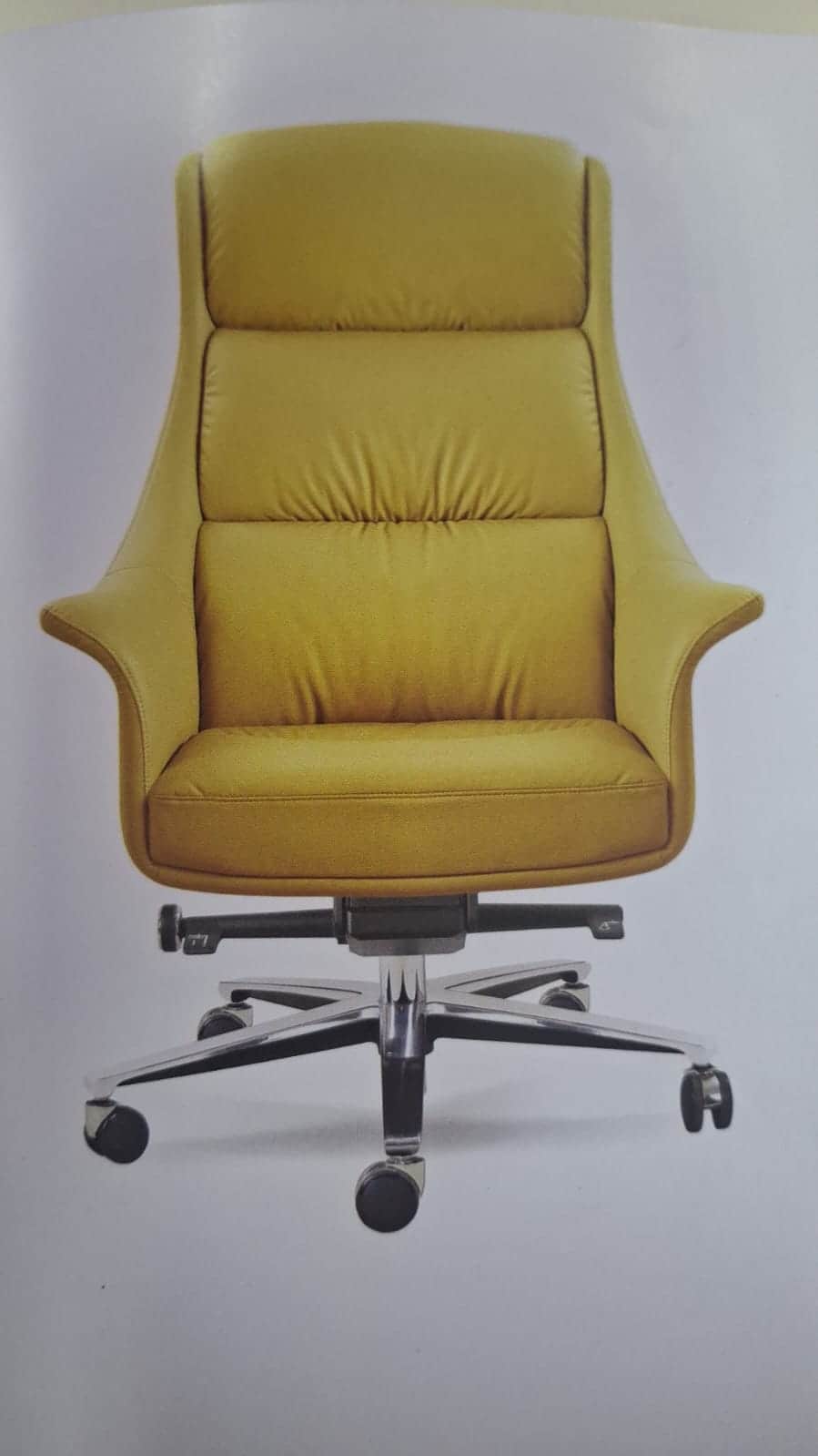 A high-back swivel office chair upholstered in mustard yellow faux leather, featuring a padded backr… — 3D model