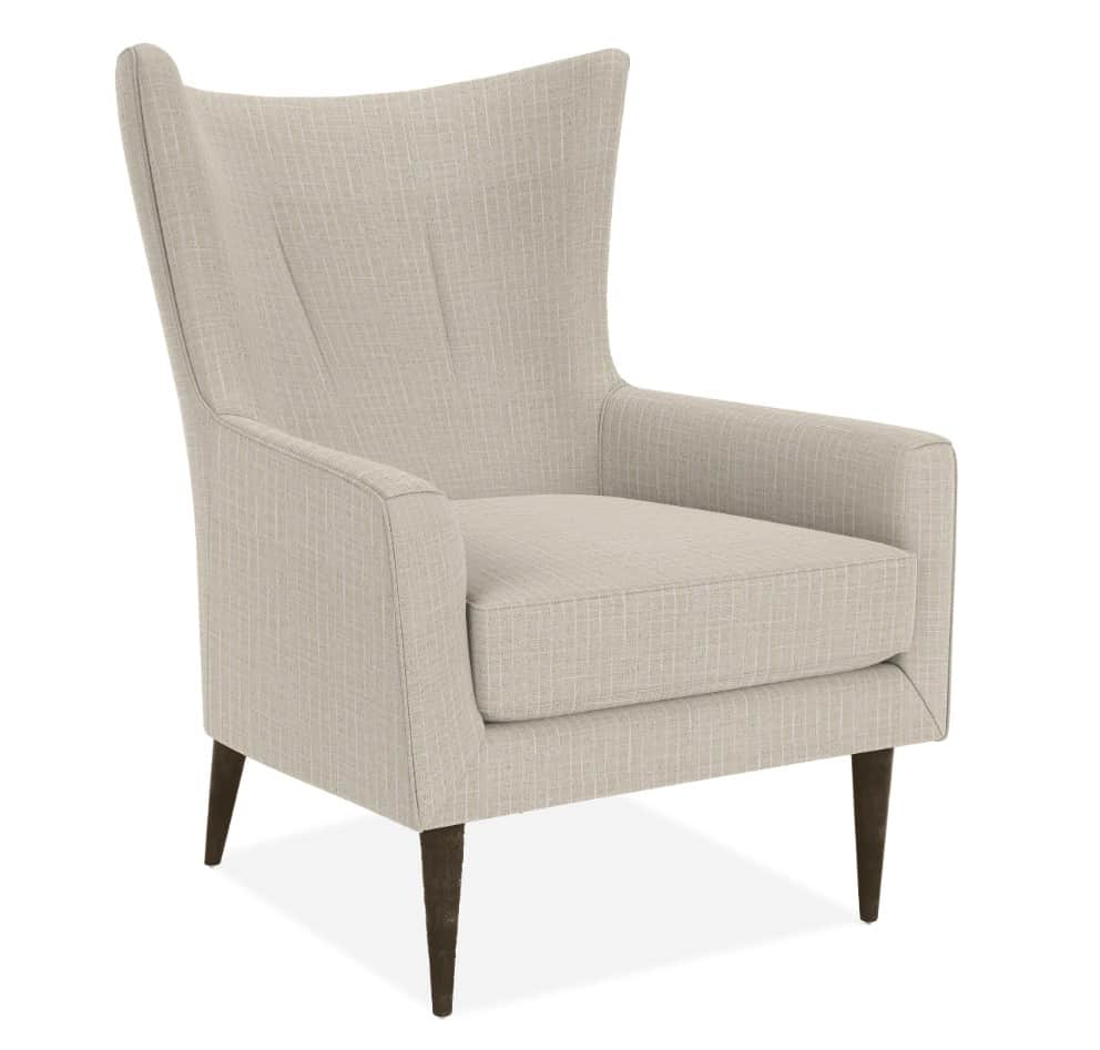 A modern upholstered armchair featuring a high back, integrated armrests, a single seat cushion, and… — 3D model
