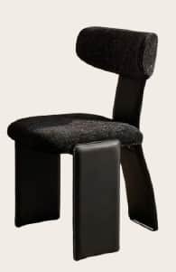 An avant-garde side chair featuring a distinctive sculptural form. It has a rounded, upholstered bac… — 3D model