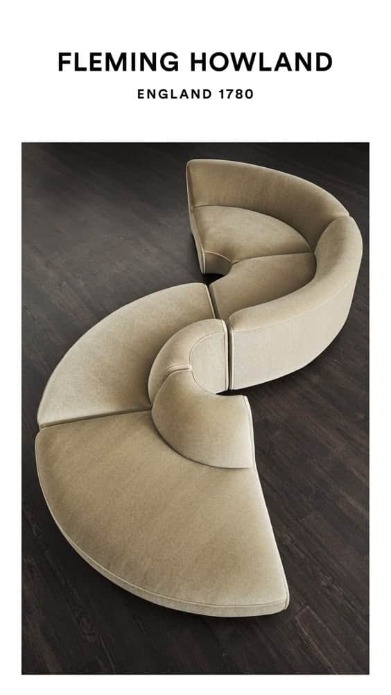 A large, contemporary modular sectional sofa composed of multiple curved segments, upholstered in a… — 3D model