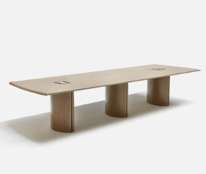 A long, rectangular conference table with a light wood finish. It features a thick, flat tabletop wi… — 3D model