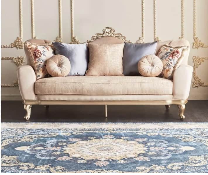 An ornate, gilded chaise lounge upholstered in a beige, velvety fabric. It features a dramatically c… — free STL 3D model