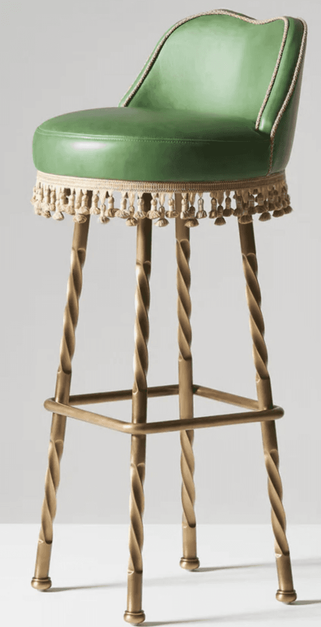 A bar stool with a green upholstered seat and back, featuring decorative trim and tassels around the… — 3D model