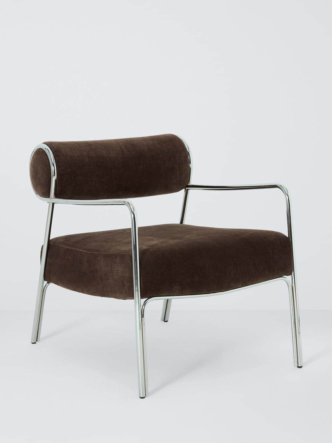 A modern armchair featuring a tubular metal frame and upholstered seat, back, and armrests. The back… — 3D model