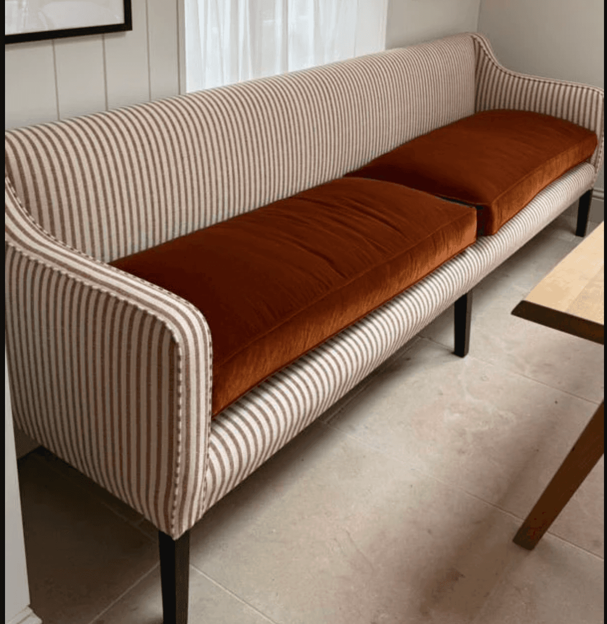 A contemporary banquette-style loveseat with a high, gently curved back and no distinct armrests. It… — 3D model