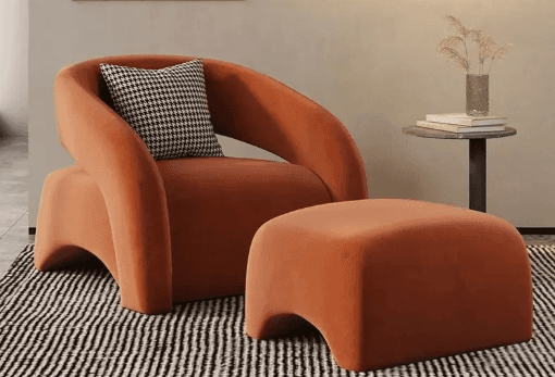 A contemporary upholstered armchair featuring a rounded, low-profile design, entirely covered in a r… — 3D model
