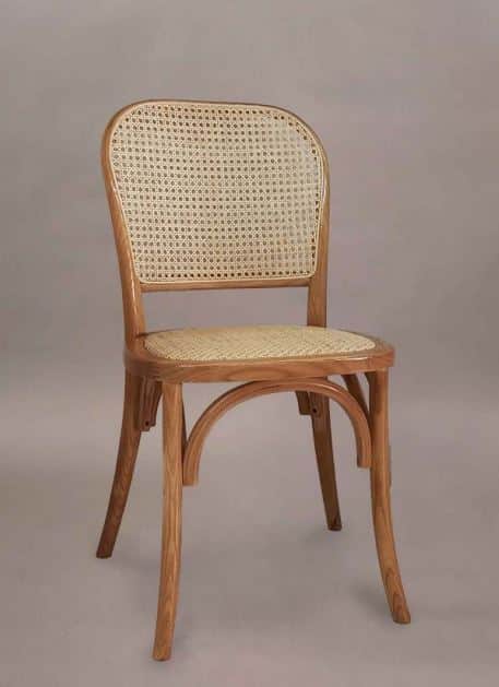 A bentwood chair with a curved backrest and seat, both featuring woven cane material. The chair has… — free GLTF 3D model