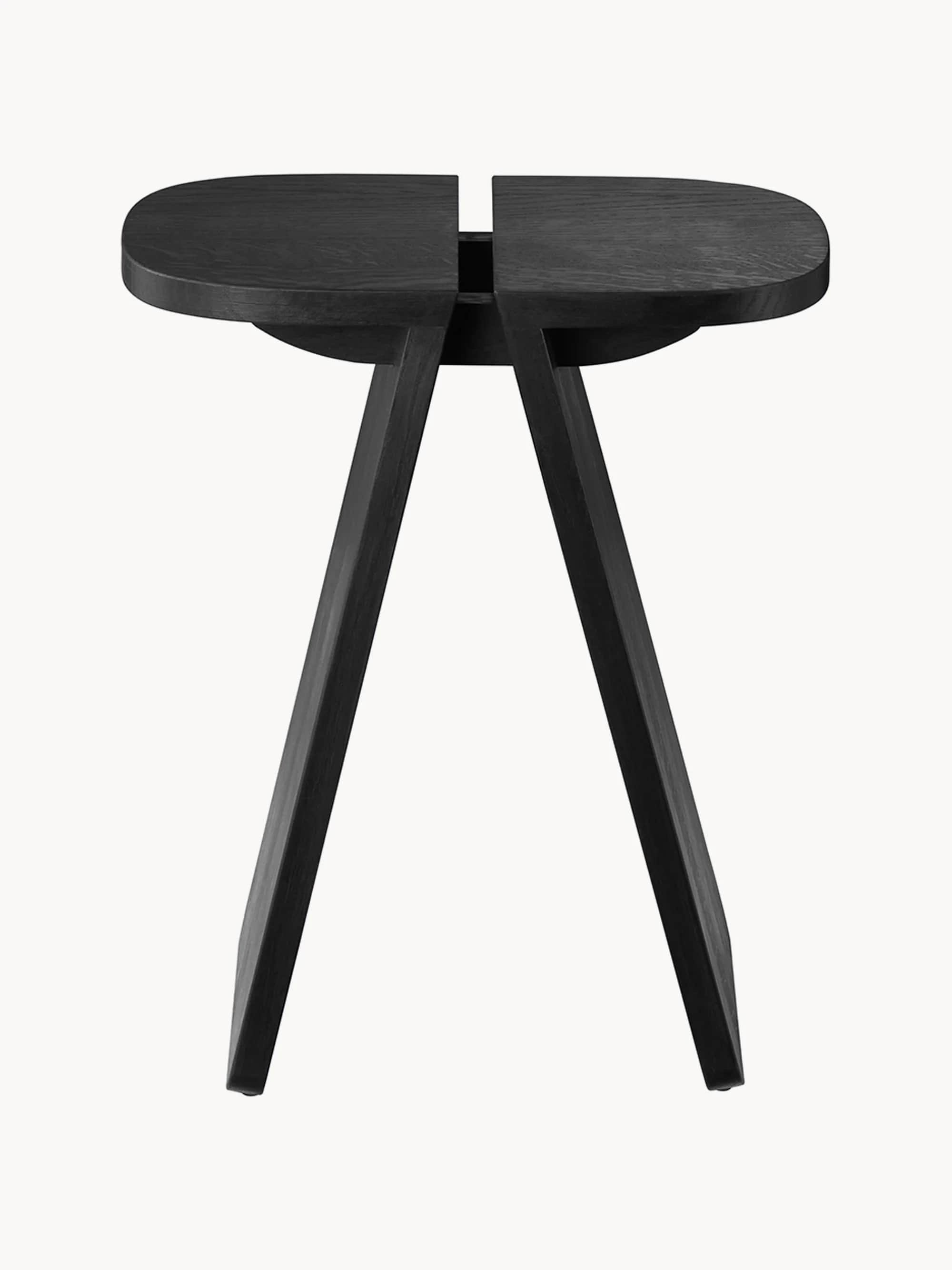 A modern side table with an organic, elongated oval tabletop featuring a central split. The tabletop… — 3D model