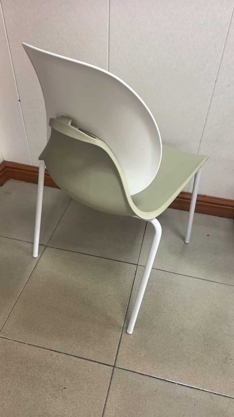A modern side chair with a molded shell seat and back. The seat and back appear to be made of a smoo… — free FBX 3D model
