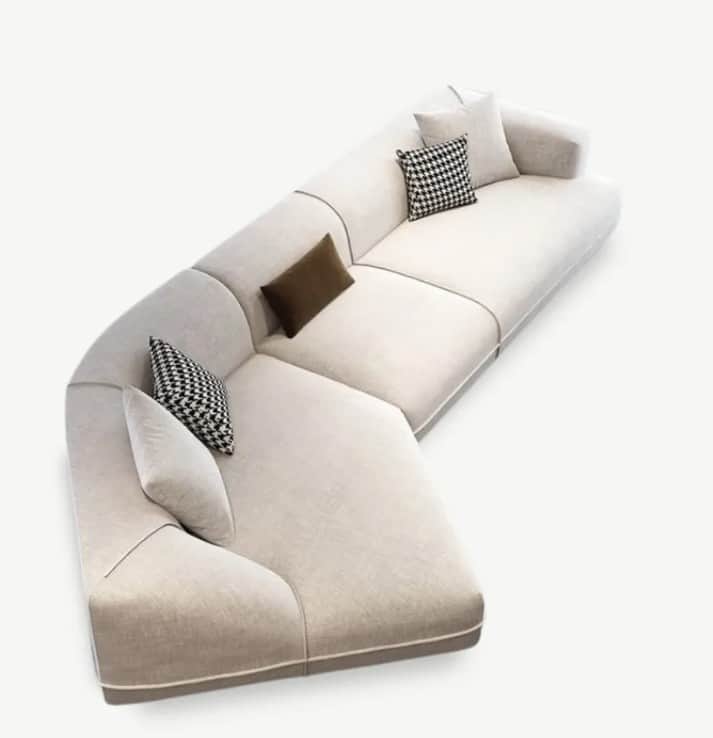 A large, L-shaped contemporary sectional sofa composed of multiple upholstered modules. It features… — 3D model