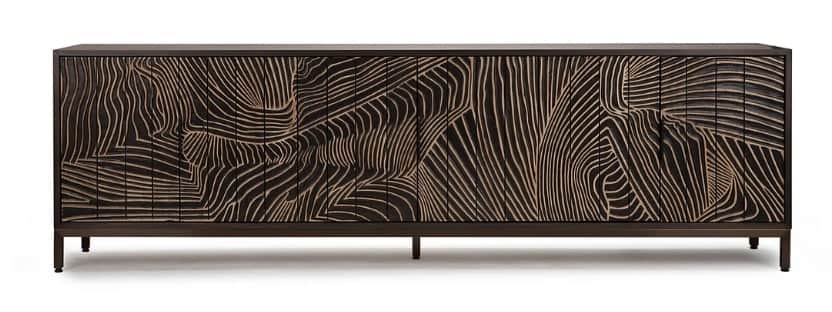 A long, low contemporary credenza featuring a dark-stained wood body with an intricately carved, und… — 3D model