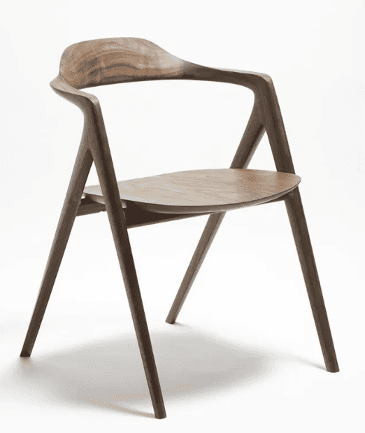 A modern wooden chair with a curved backrest and seat. The chair features a four-legged base with ta… — free GLTF 3D model