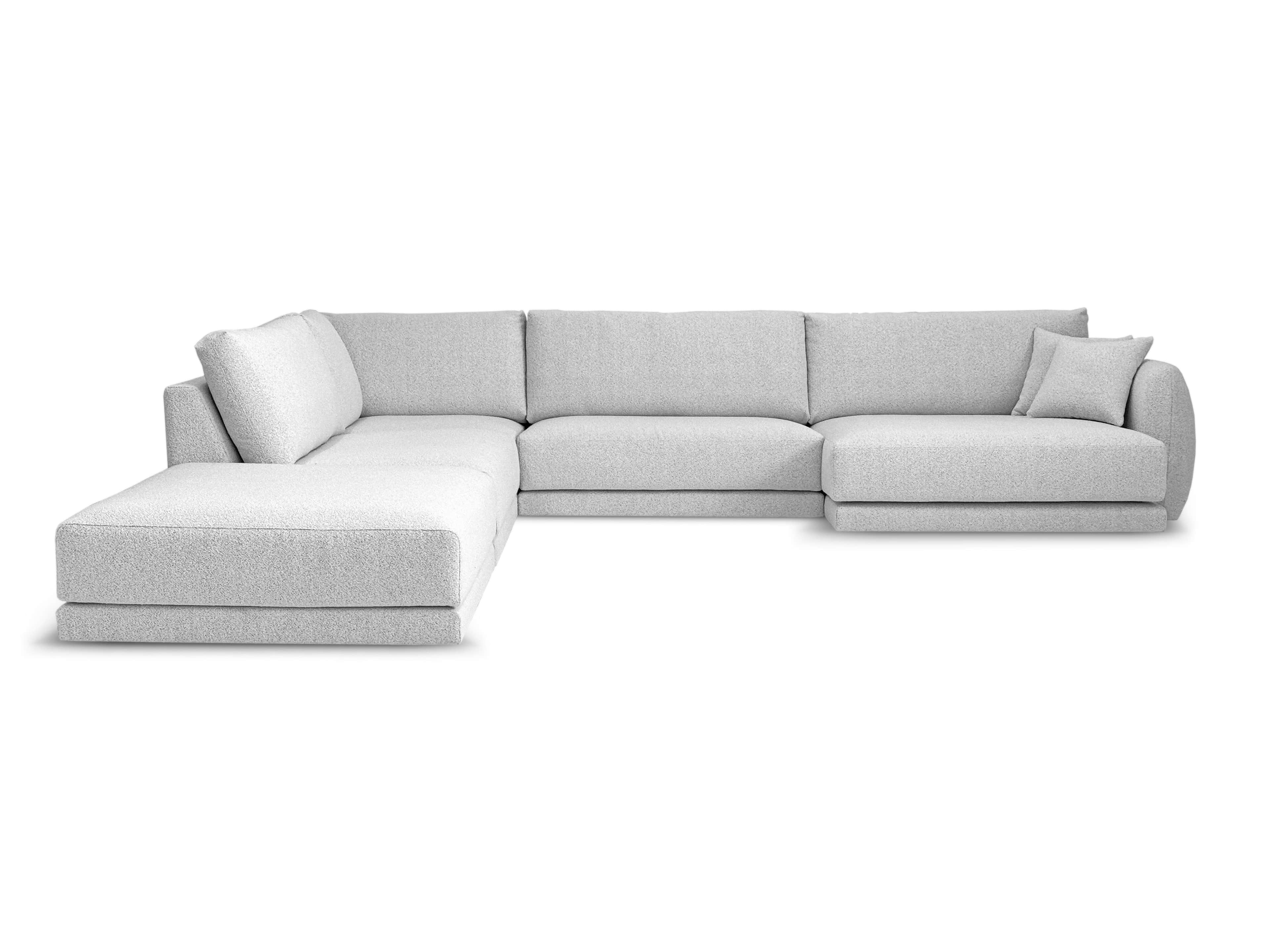 A modern, light gray, sectional sofa with a chaise lounge. The sofa features a low profile, blocky a… — 3D model