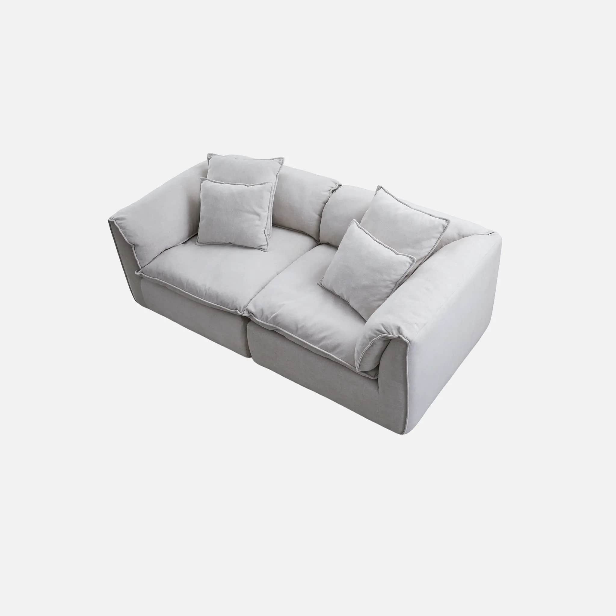 A contemporary light gray two-seater sofa, composed of two modular sections, featuring a low profile… — 3D model