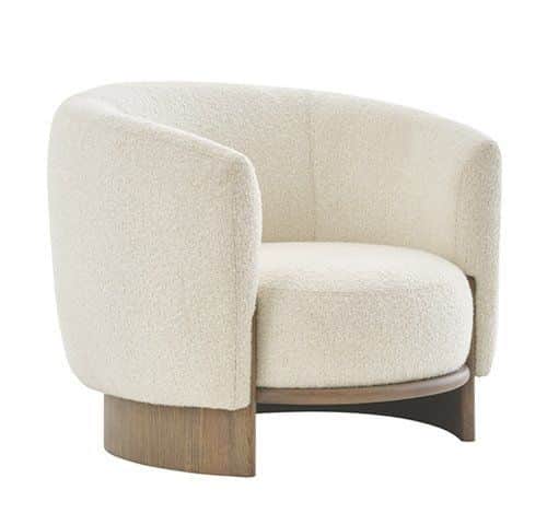 This is a contemporary armchair featuring a rounded, barrel-like silhouette. It is upholstered in a… — 3D model