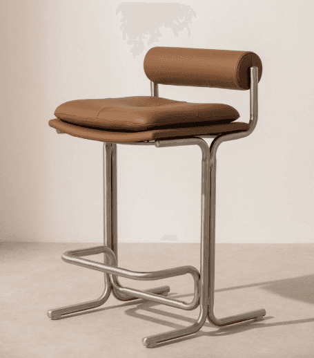 A modern bar stool with a brushed metal frame and a padded seat and backrest upholstered in brown le… — 3D model