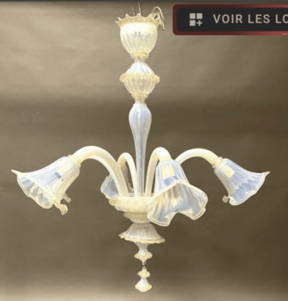 A decorative chandelier with multiple arms, each ending in a bell-shaped glass shade. The central bo… — 3D model