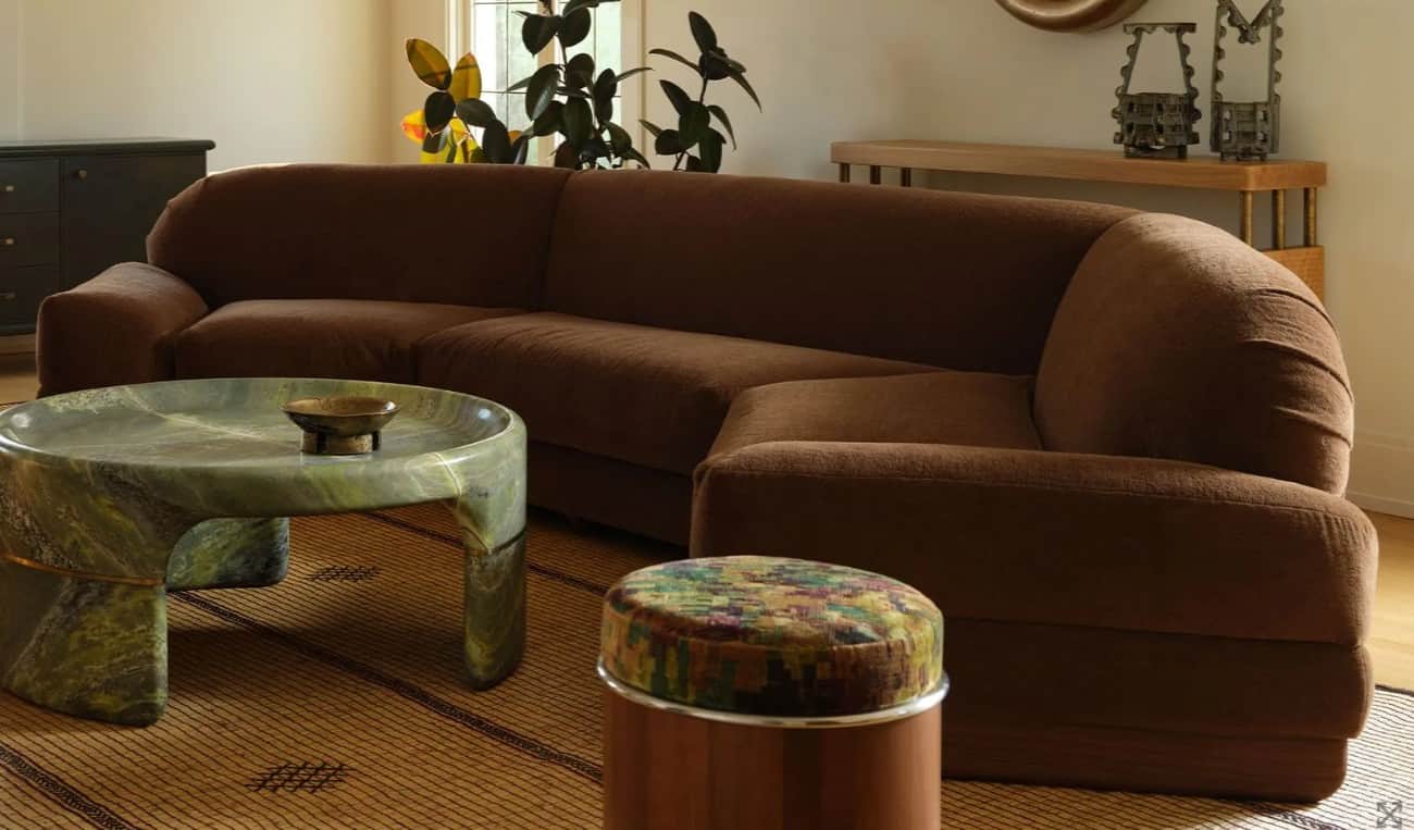 A modular, curved sectional sofa with a low profile. It features rounded armrests and backrests, and… — free FBX 3D model